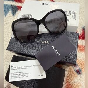 Prada PR 04ZS 1AB5Z1 Black Plastic Butterfly Sunglasses Dark Grey Polarized Lens